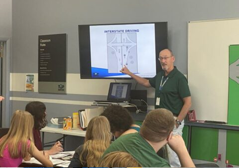 Top Driver instructor in a classroom full of students